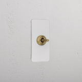 1G Architrave Centre Retractive Toggle Switch - Paintable Antique Brass